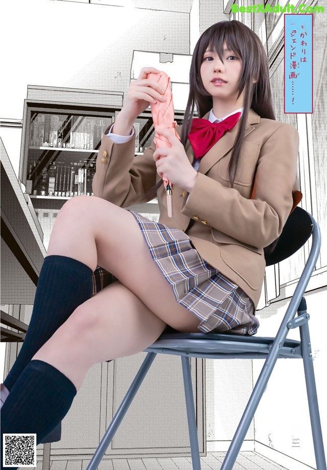 A woman in a school uniform sitting on a chair.